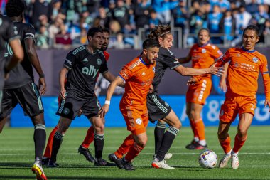 Amerika Birleşik Devletleri 'nden Charlotte FC Orta saha oyuncusu BENJAMIN BENDER, ABD' nin Kuzey Carolina eyaletinin Charlotte kentindeki Bank of America Stadyumu 'nda FC Cincinnati' ye karşı oynuyor. Charlotte FC düzenlemelerde konuk FC Cincinnati 'yi 2-0 yendi..