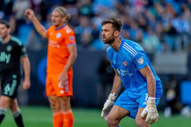 FC Cincinnati kalecisi ALEC KANN, Charlotte, Kuzey Carolina 'daki Bank of America Stadyumu' nda The Charlotte FC 'ye karşı oynuyor. Charlotte FC düzenlemelerde konuk FC Cincinnati 'yi 2-0 yendi..