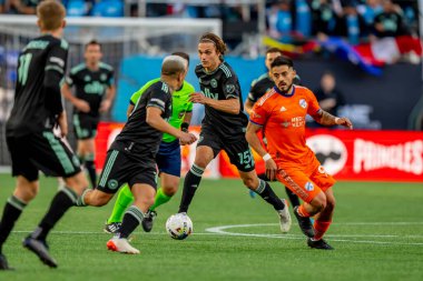 Amerika Birleşik Devletleri 'nden Charlotte FC Orta saha oyuncusu BENJAMIN BENDER, ABD' nin Kuzey Carolina eyaletinin Charlotte kentindeki Bank of America Stadyumu 'nda FC Cincinnati' ye karşı oynuyor. Charlotte FC düzenlemelerde konuk FC Cincinnati 'yi 2-0 yendi..