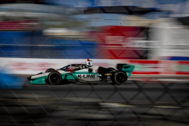 Stouffville, Kanada 'dan DALTON KELLETT (4), Long Beach, Kaliforniya' daki Long Beach Caddeleri 'nde düzenlenen Acura Grand Prix antrenmanı sırasında virajlarda koşuyor..