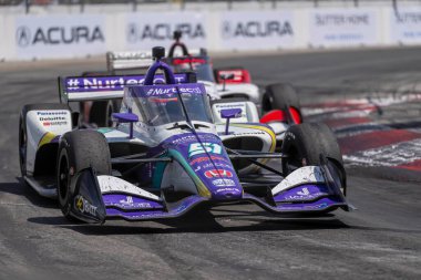 Tokyo, Japonya 'dan TAKUMA SATO (51) Long Beach' in Long Beach sokaklarındaki Acura Grand Prix 'si sırasında dönüşlerde yarışıyor..