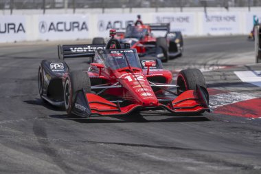 Toowoomba, Avustralya 'dan Will PowER (12) Long Beach' in Long Beach Caddeleri 'ndeki Acura Grand Prix sırasında dönüşlerde yarışıyor..