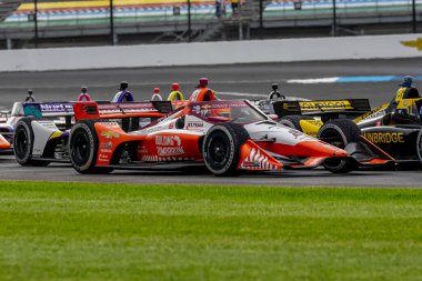 Hollanda 'nın Hoofddorp kentinden RINUS VEEthe (R) (21) Indianapolis Indiana' daki Indianapolis Motor Yarış Pisti 'ndeki GMR Grand Prix sırasında virajlarda yarışır..