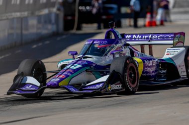 Tokyo, Japonya 'dan TAKUMA SATO (51) Detroit' teki Belle Isle Park 'ta yapılan Chevrolet Detroit Grand Prix antrenmanı sırasında virajlarda koşar..