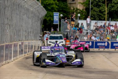 Tokyo, Japonya 'dan TAKUMA SATO (51) Detroit' teki Belle Isle Park 'ta yapılan Chevrolet Detroit Grand Prix sırasında virajlarda yarıştı..