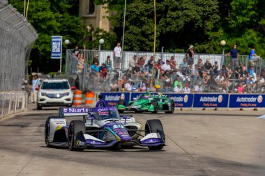 Tokyo, Japonya 'dan TAKUMA SATO (51) Detroit' teki Belle Isle Park 'ta yapılan Chevrolet Detroit Grand Prix sırasında virajlarda yarıştı..