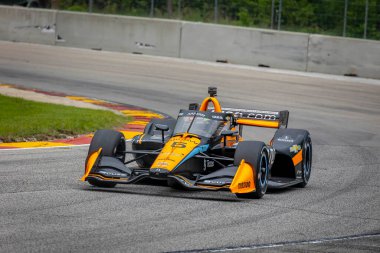 Monterey, Meksika 'dan PATO OWARD (5), Plymouth 1. Dünya Savaşı' nda Road America 'daki Sonsio Grand Prix için pratik yapmaya hazırlanıyor..