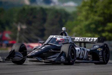 Bogota 'dan TATIANA CALDERON (11) (R), Kolombiya Honda Indy 200 için Lexington OH' daki Ohio Spor Otomobili Kursu 'nda uygulamalar.