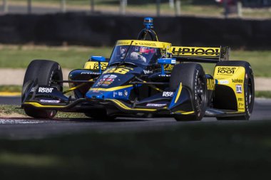 Cenevre, İsviçre 'den ROMAIN GROSJEAN (28), Lexington OH' daki Orta Ohio Spor Otomobil Kursu 'nda Honda Indy 200 antrenman oturumu sırasında virajlarda koşuyor..