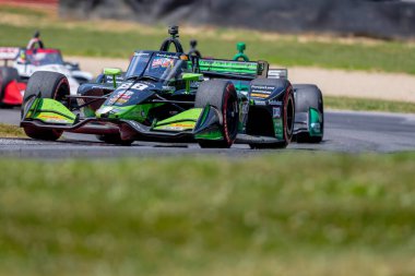 Cenevre, İsviçre 'den ROMAIN GROSJEAN (28), Lexington OH' daki Ohio Spor Otomobili Kursu 'nda Honda Indy 200 sırasındaki virajlarda yarışıyor..