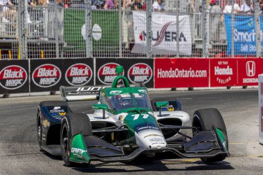 Cambridge, İngiltere 'den CALLUM LLOTT (77) (R) Toronto' daki Toronto Caddeleri Sergisi 'nde Honda Indy Toronto için yapılan bir çalışma sırasında virajlardan geçer..