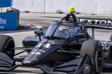 KYLE KIRKWOOD (14) (R) (Jüpiter, Florida) Toronto 'daki Toronto Caddeleri Sergi Salonu' nda Honda Indy Toronto için yapılan bir tatbikat sırasında virajlardan geçer..