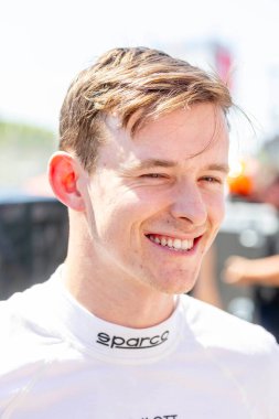 Cambridge, İngiltere 'den CALLUM LLOTT (77) (R), Toronto Streets of Toronto Exhibition Place' de Honda Indy Toronto 'ya katılmaya hak kazandı..