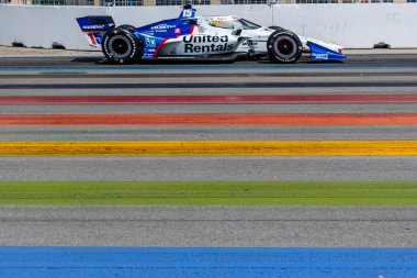 New Albany, Ohio 'dan GRAHAM RAHAL (15), Toronto' daki Toronto Sokak Sergisi 'ndeki Honda Indy Toronto' nun antrenman oturumunda virajlardan geçiyor..