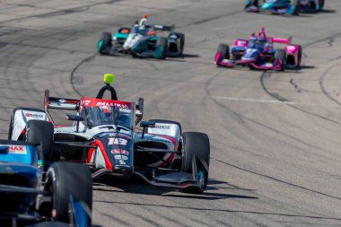 Şikago, Illinois 'den DAVID MALUKAS (18) (R) Newton IA' daki Iowa Speedway 250 'de HY-VEEDEALS.COM sırasında dönüşlerden geçer..