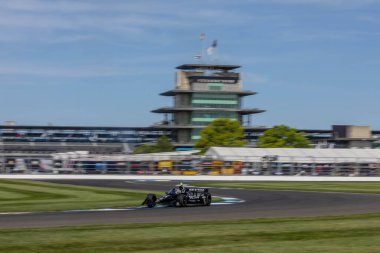 Jüpiter, Florida 'dan KYLE KIRKWOOD (14) (R) Indianapolis' teki Gallagher Grand Prix 'si için yapılan tatbikat sırasında virajlardan geçer..