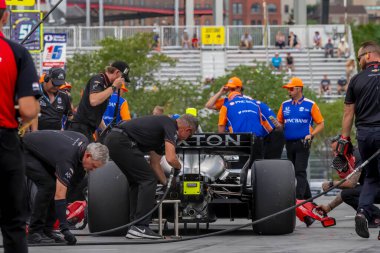 Crew members of AJFoyt Racing prepare their race car before a practice for the Big Machine Music City Grand Prix in Nashville, TN, USA.