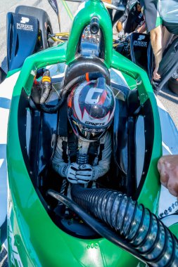CALLUM LLOTT (77) (R) of Cambridge, England comes down pit road during a practice for the Bommarito Automotive Group 500 at the World Wide Technology Raceway in Madison IL.