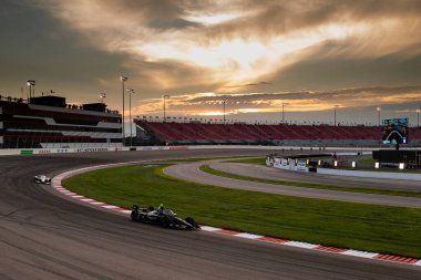 KYLE KIRKWOOD (14) (R) of Jupiter, Florida travels through the turns during a practice for the Bommarito Automotive Group 500 at the World Wide Technology Raceway in Madison IL.