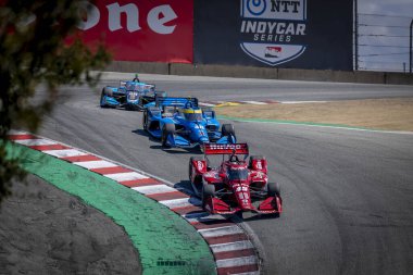 Bassingham, İngiltere 'den Jack HARVEY (45) Monterey' deki WeatherTech Raceway Laguna Seca 'da düzenlenen Firestone Grand Prix' sinde virajlarda yarışıyor..