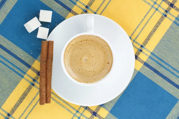 Coffee with cream and cinnamon — Stock Photo, Image