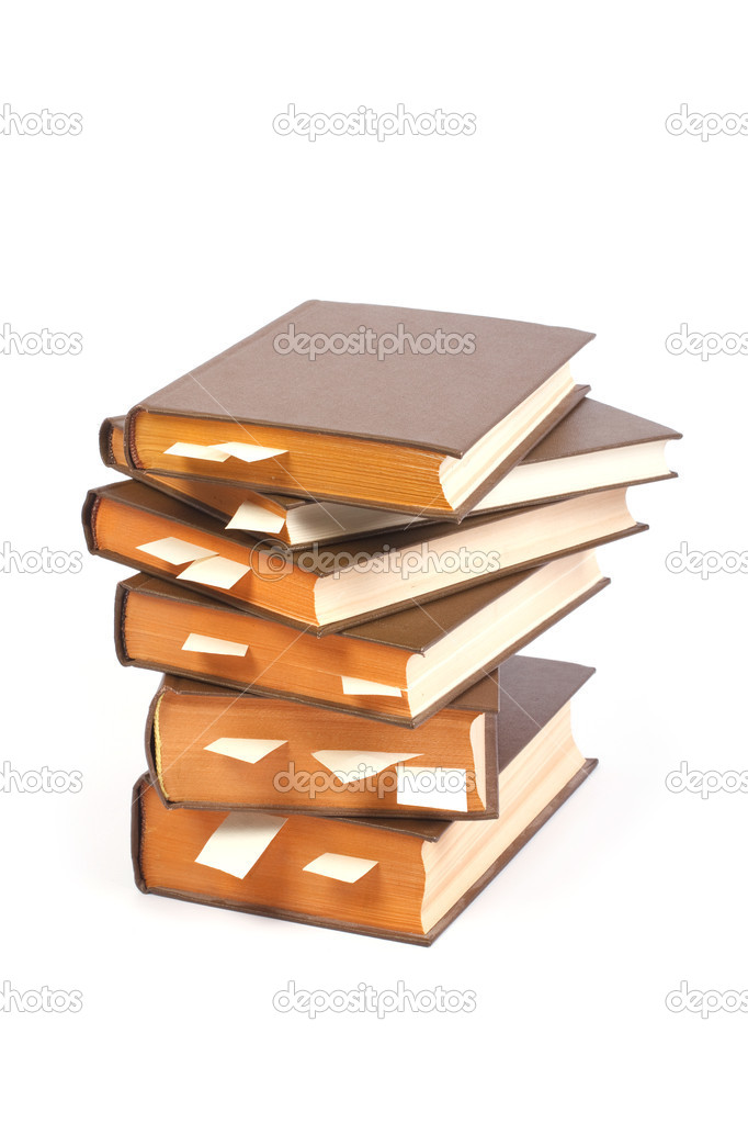 Stack of books with bookmarks