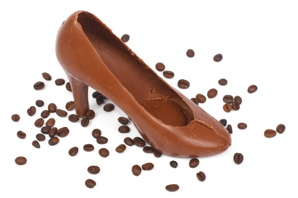 Cioccolato Scarpe da donna e chicchi di caffè rovesciati — Foto Stock