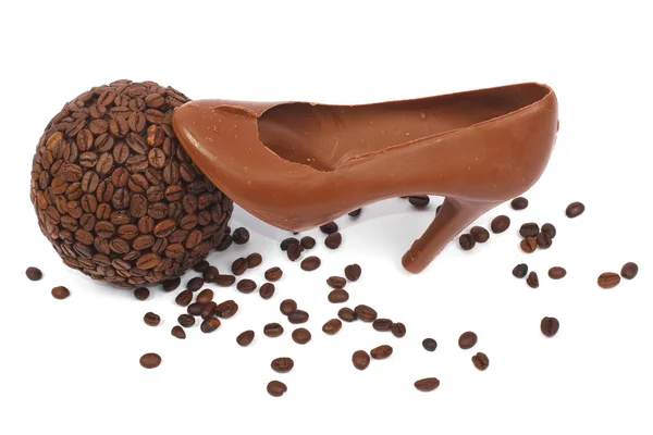 Bowl of coffee and chocolate shoe isolated — Stock Photo, Image