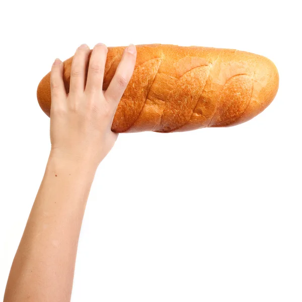 Mão segura um pão — Fotografia de Stock