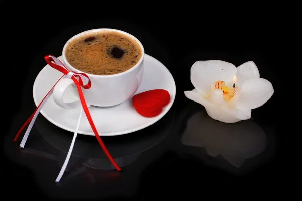 Festive cup of coffee and candle — Stock Photo, Image