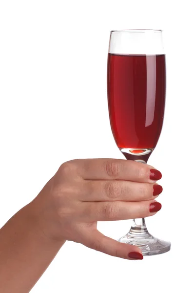 Un bicchiere di vino in una mano femminile — Foto Stock