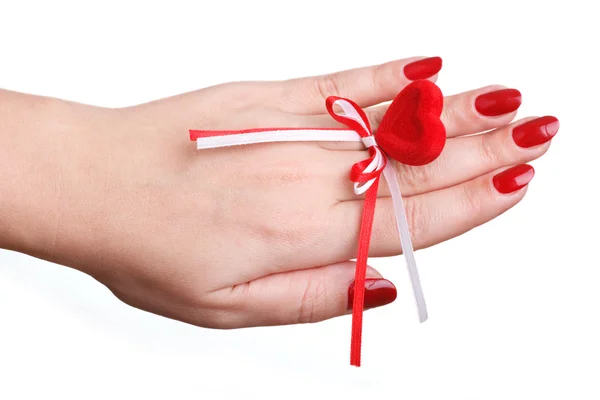 Red manicure and red heart — Stock Photo, Image