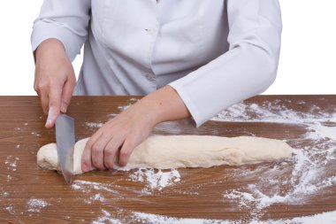 Baker kısımları ahşap tahta üzerinde içine hamur keser