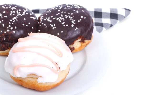 Three delicious fresh donuts in the glaze — Stock Photo, Image