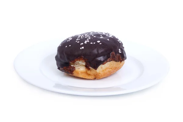 Fresh delicious chocolate donut isolated on a white plate — Stock Photo, Image