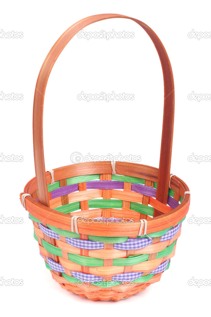 Empty colored wicker basket isolated on white background