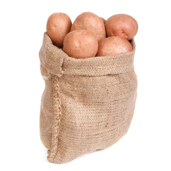 Mogen potatis i påsen isolerad på vit bakgrund — Stockfoto