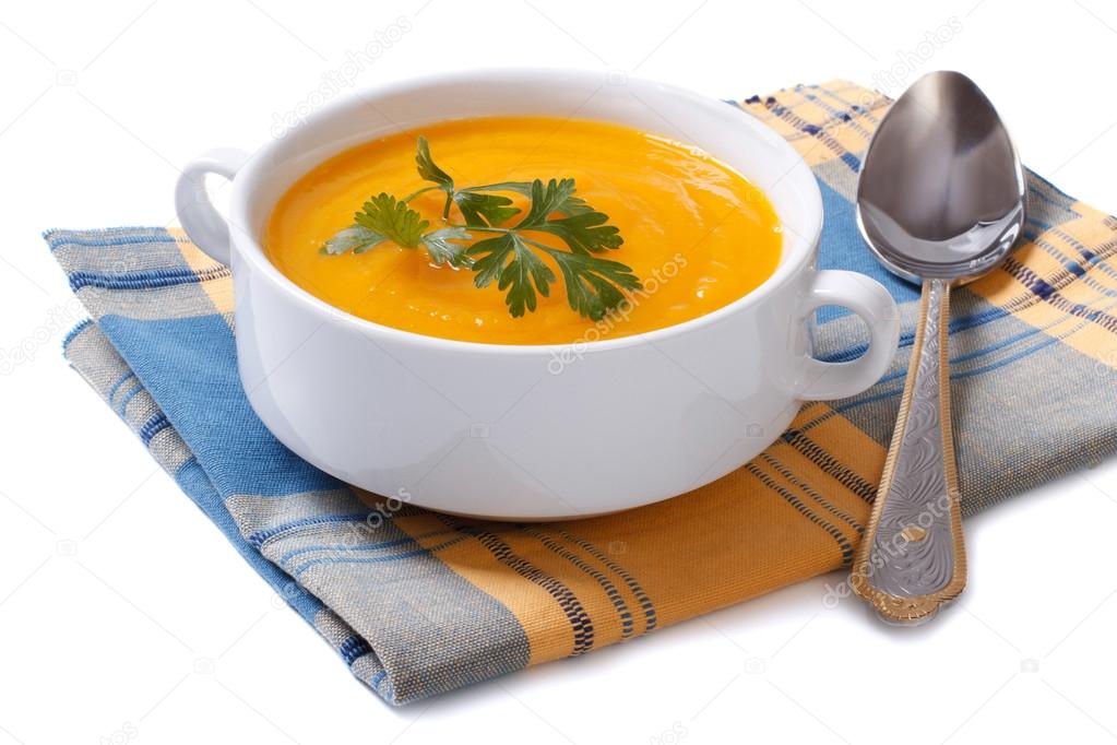 Pumpkin soup on a napkin isolated on white background