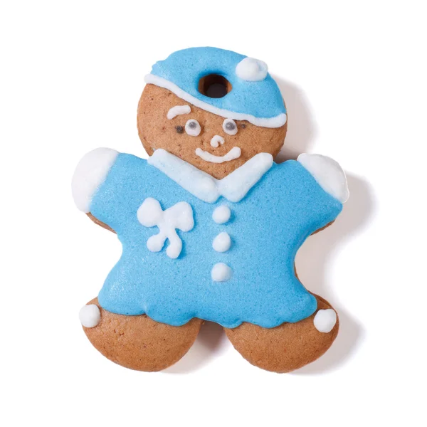 Gingerbread man in a blue coat and hat isolated on white — Stock Photo, Image