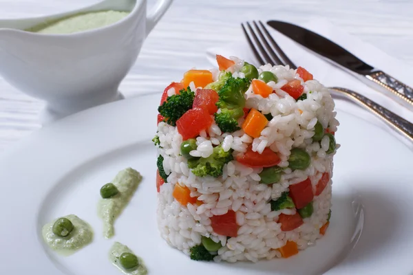 Vegetable risotto with sauce on the table — Stock Photo, Image