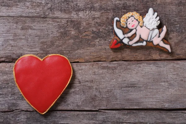 Frame for Valentine's Day. Cupid shoots arrows at hearts — Stock Photo, Image