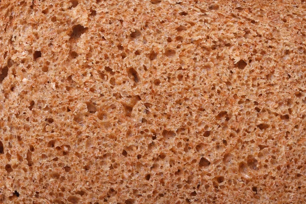 Texture of fresh dark bread close up. — Stock Photo, Image