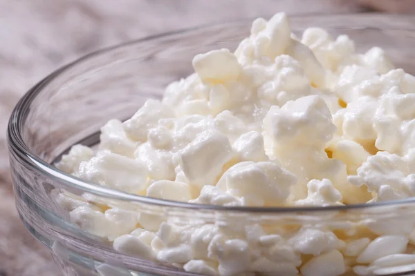 White cottage cheese close-up in glass bowl — Stock Photo, Image