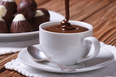çikolata bir fincan closeup arka plan sweets dökülür초콜릿 컵 근접 촬영에 배경 과자에 부 어