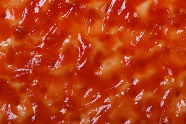 Base voor pizza met tomatensaus. macro — Stockfoto