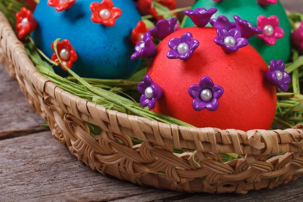 Easter eggs in a basket closeup — Stock Photo, Image