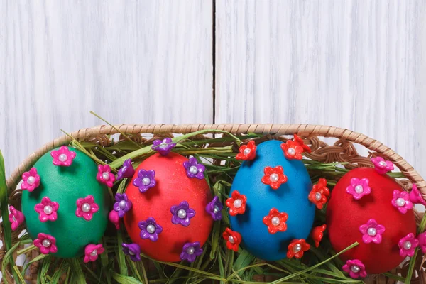 Easter eggs decorated with flowers closeup — Stock Photo, Image