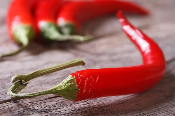 Red chili pepper on the table macro — Stock Photo, Image