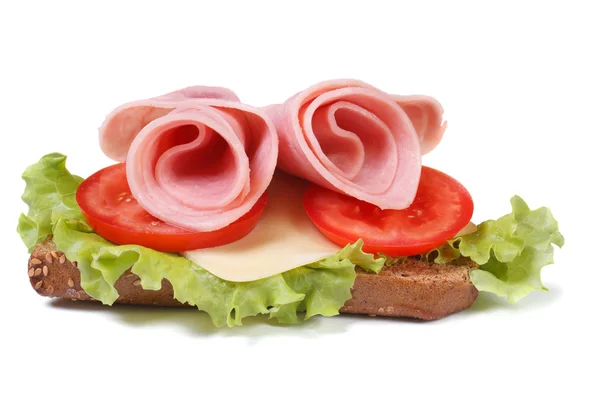 Jambon ve izole sebze ile şenlikli sandviç — Stok fotoğraf
