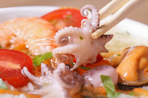 Small an octopus hold chopsticks macro — Stock Photo, Image